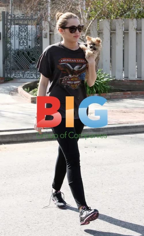 Miley Cyrus with New Puppy