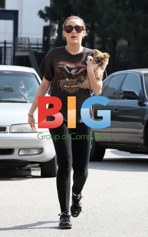Miley Cyrus and New Puppy