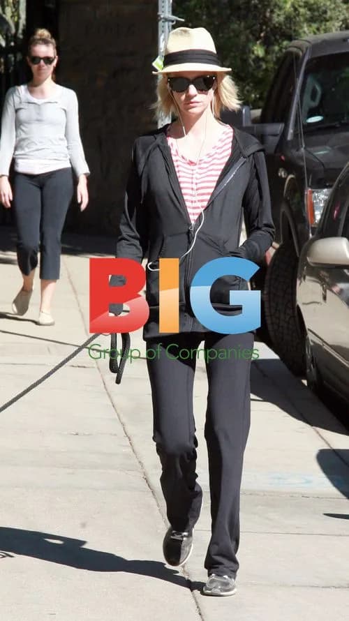 January Jones walks dog in LA park