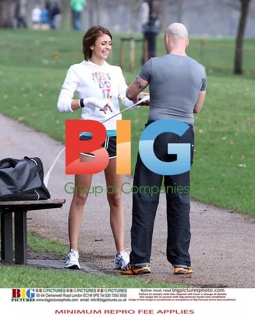 Liz Locke and personal trainer exercise in London park