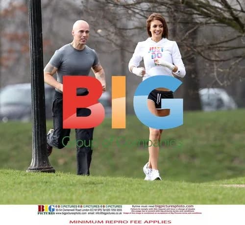 Liz Locke and personal trainer exercise in London park
