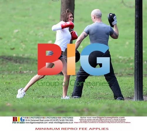 Liz Locke exercises with personal trainer in London