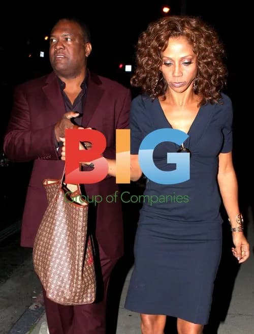 Rodney Peete and Holly Robinson leaving Boa