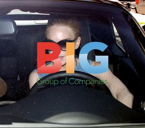Lindsay Lohan Spotted Driving in Porsche