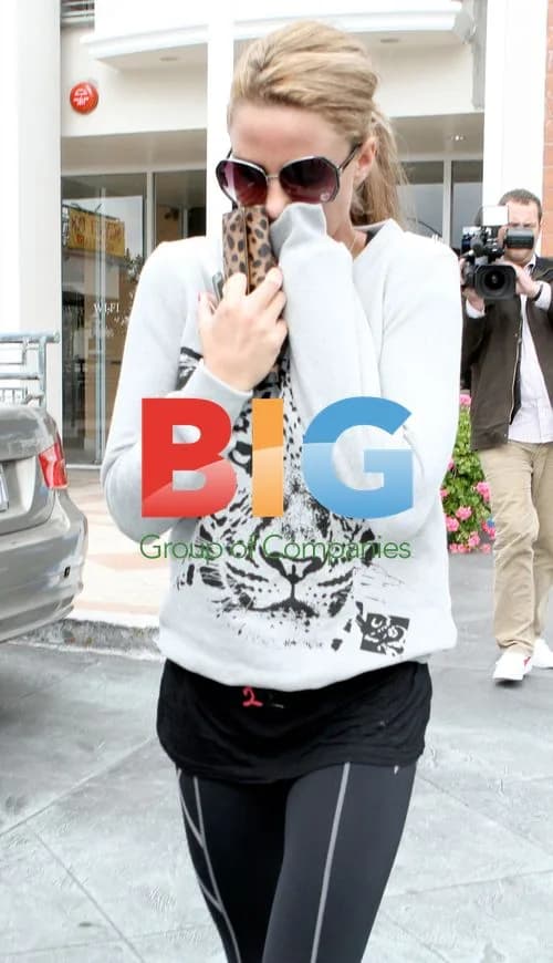 Katie Price Covers Mouth After Lunch