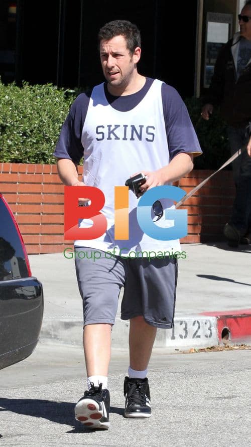 Adam Sandler Leaves Restaurant in Casual Attire