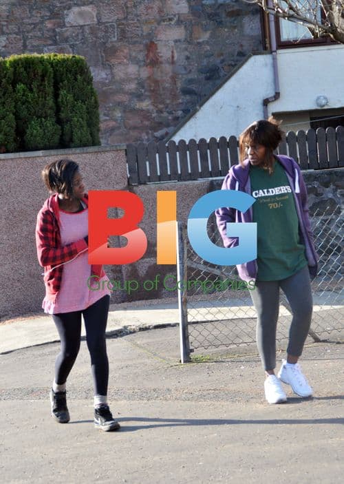 Former X Factor contestant Gamu and her mother take a stroll