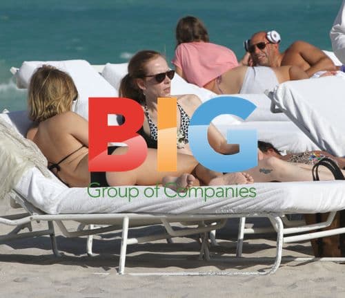 Chloe Sevigny Relaxing on Beach with Friends