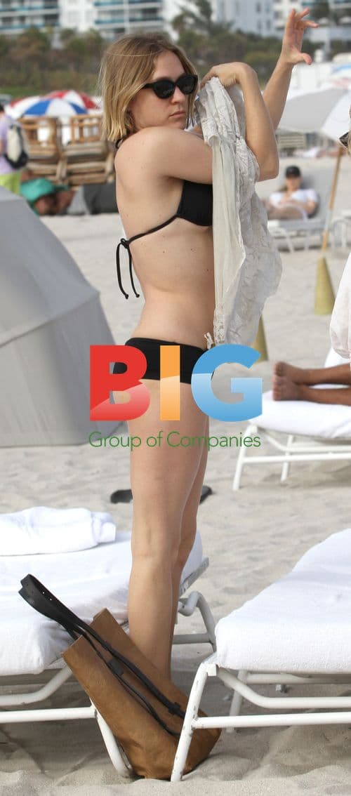 Chloe Sevigny Relaxing on the Beach