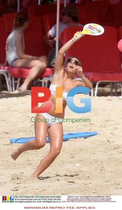 Chloe Green plays tennis on Caribbean beach