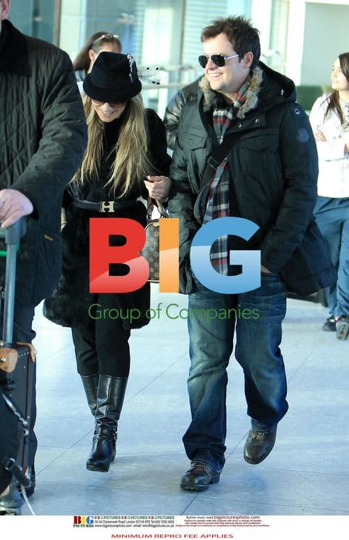 Declan Donnelly and Georgie Thompson arrive at Heathrow
