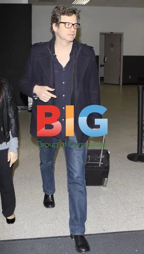 Colin Firth Arrives at LAX with Carry-On