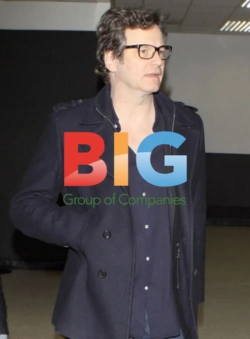 Colin Firth Arrives at LAX with Luggage