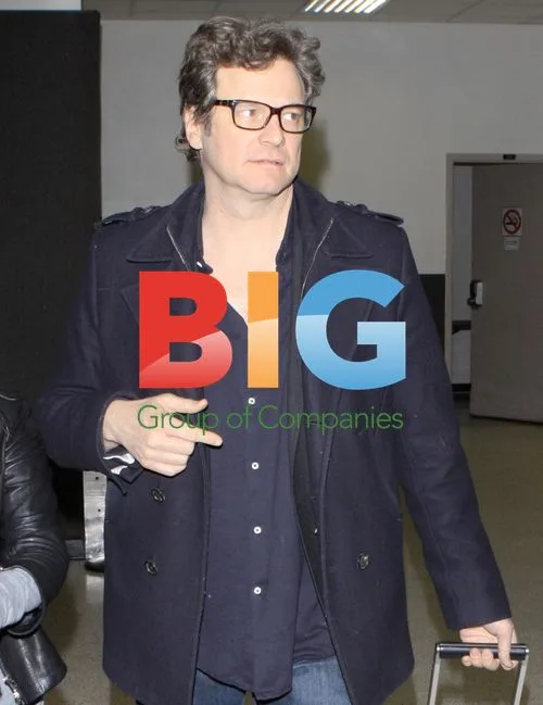 Colin Firth Arrives at LAX with Carry-On