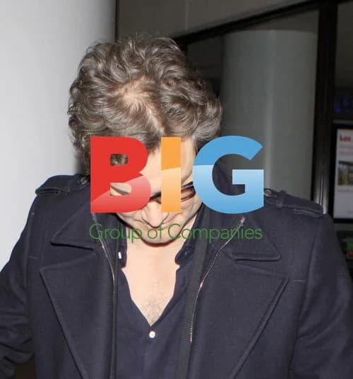 Colin Firth Arrives at LAX with Carry-On Luggage