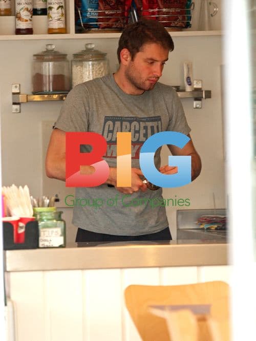 Jonathan Powell opens mother's cafe in Cardiff