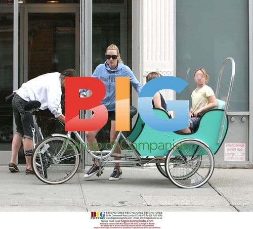 Kate Winslet Rides Tricycle with Kids