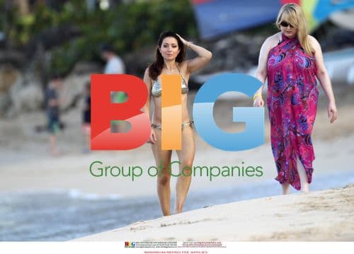 Claire Nasir in Gold Bikini in Barbados