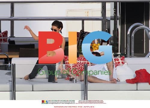 Simon Cowell and Mezhgan Hussainy on Quad Bikes