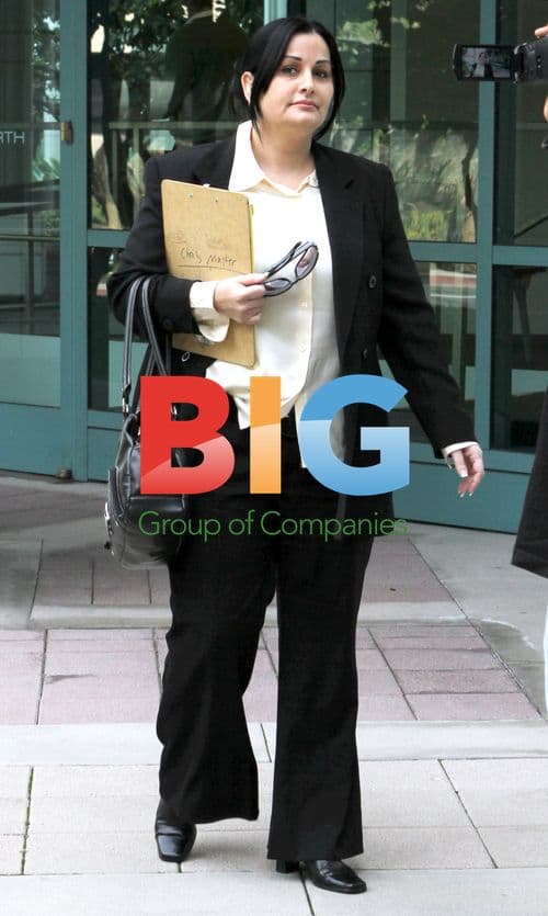 Melissa Johnson Arrives for Deposition in Trademark Case