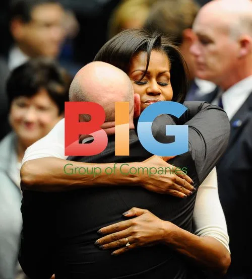 Michelle Obama Hugs Mark Kelly at Tucson Memorial