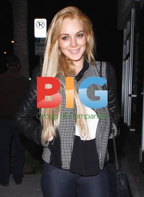 Lindsay Lohan Leaves Bar with Police Escort