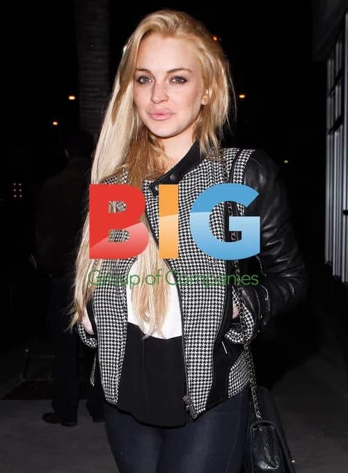 Lindsay Lohan Escorted by Police