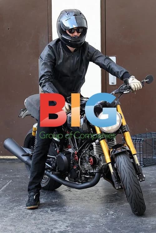 Orlando Bloom on Ducati with Woman