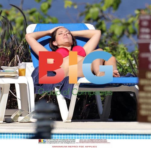 Clare Nasir in Red Bikini on Caribbean Beach