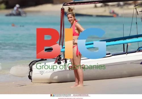 Celebrity Wardrobe Malfunction on Caribbean Beach
