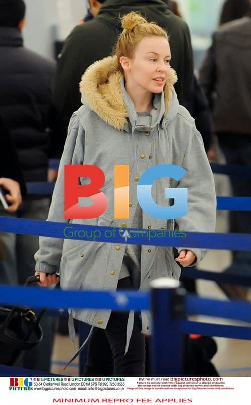 Kylie Minogue and Andres Velencoso Kiss in Spain