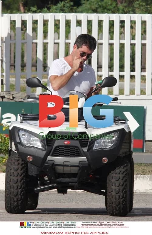 Simon Cowell and Mezhgan Hussainy Riding Quad Bikes in Caribbean