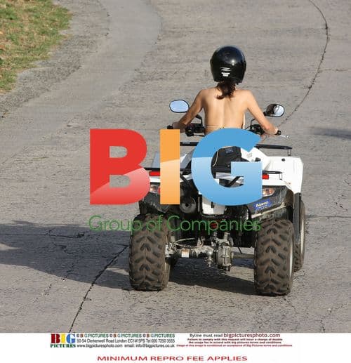 Simon Cowell and Mezhgan Hussainy on Quad Bikes
