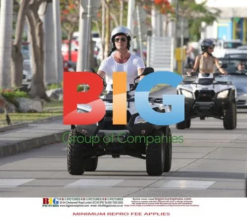 Simon Cowell and Mezhgan on Quad Bikes