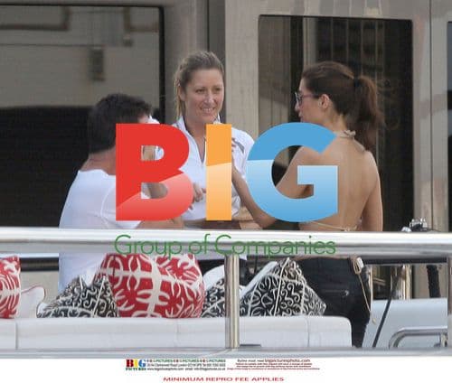 Simon Cowell and Mezhgan Hussainy on Quad Bikes