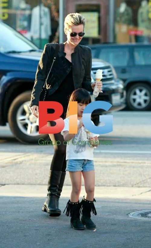 Laeticia Hallyday and Daughter Jade Eating Ice Cream