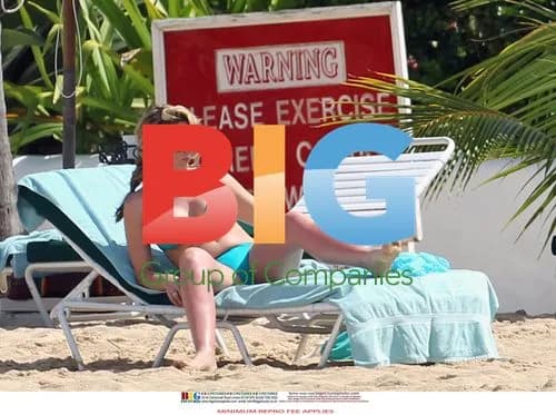 Claire Sweeney in Turquoise Bikini