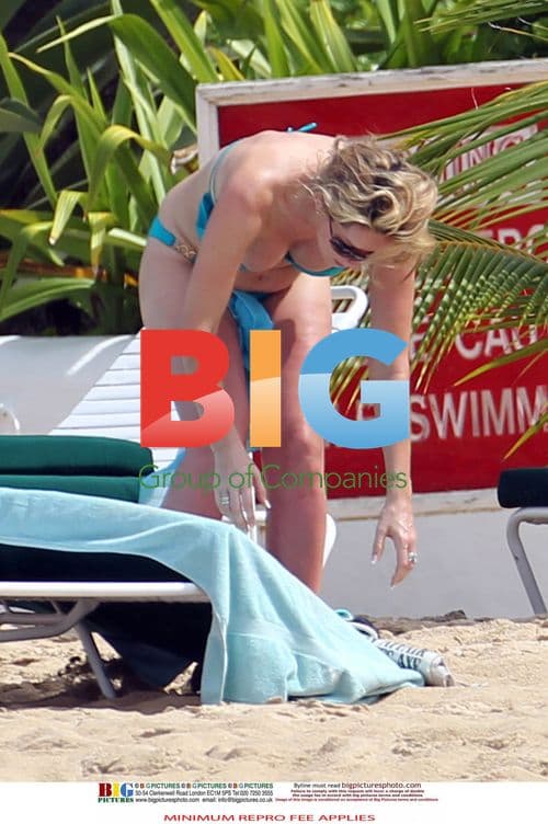 Claire Sweeney Relaxes in Turquoise Bikini