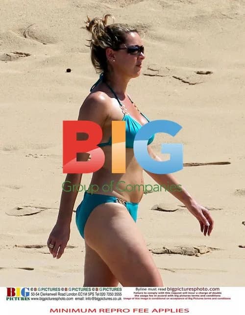Claire Sweeney Relaxes in Turquoise Bikini