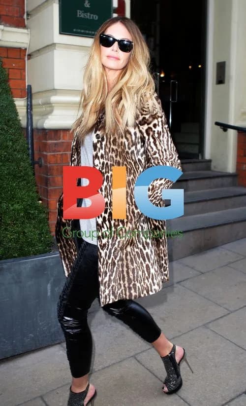 Elle Macpherson Leaves Hotel in UK