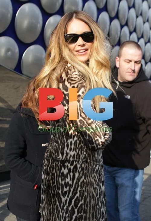 Elle Macpherson Leaving Hotel for TV Show