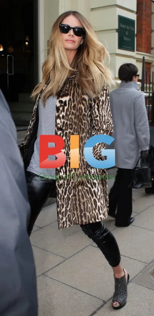 Elle Macpherson Leaves Hotel for TV Filming
