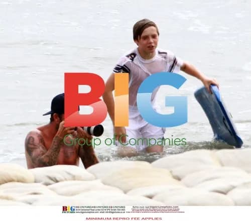 David Beckham with sons at beach