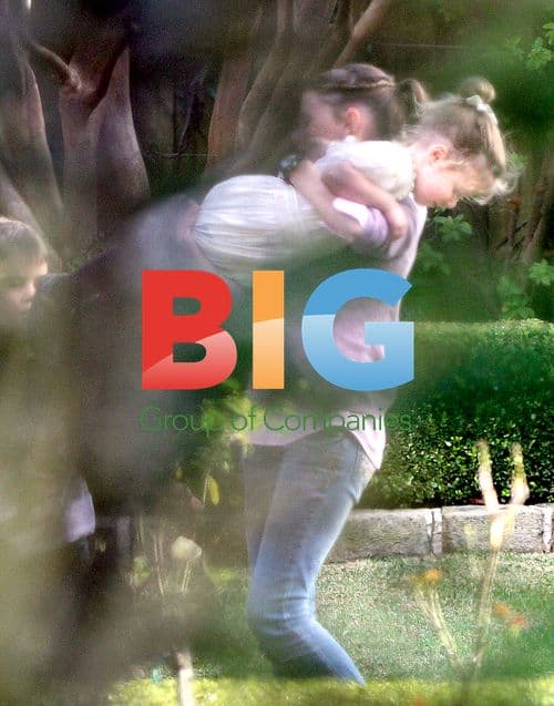 Sunday Rose Kidman playing in garden