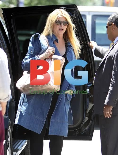 Kirstie Alley Leaving Hotel in NYC