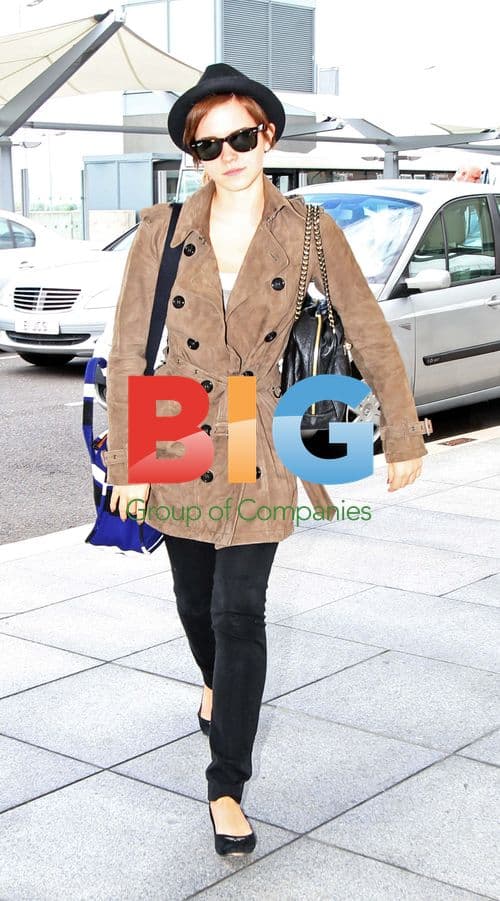 Emma Watson Arriving at Heathrow Airport