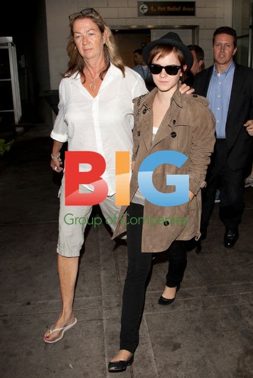 Rupert Grint and Emma Watson Arrive at JFK