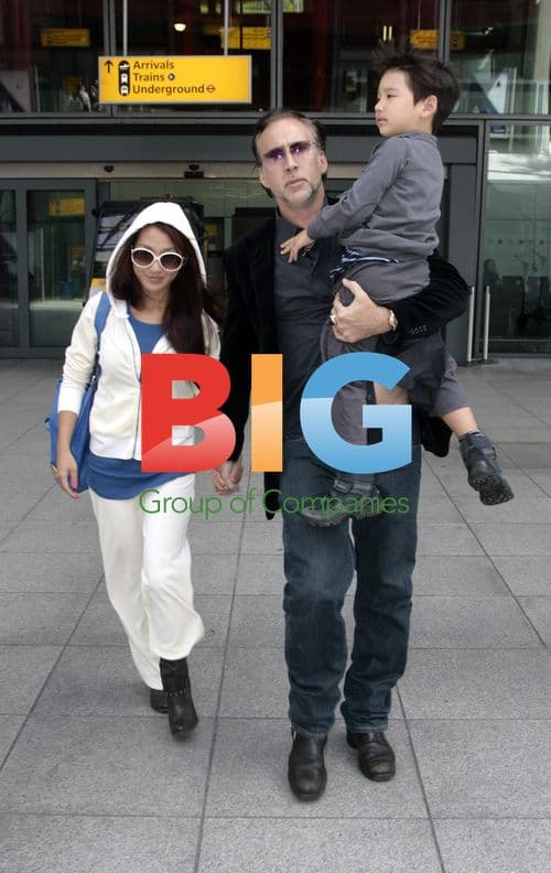 Nicolas Cage Arrives at Heathrow with Family
