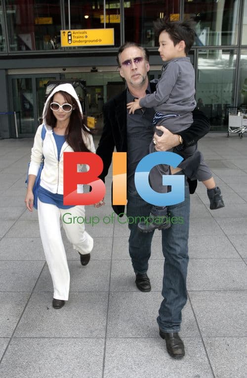 Nicolas Cage Arrives at Heathrow with Family