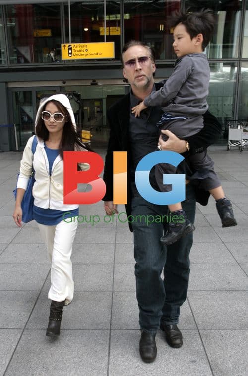 Nicolas Cage Arrives at Heathrow with Family